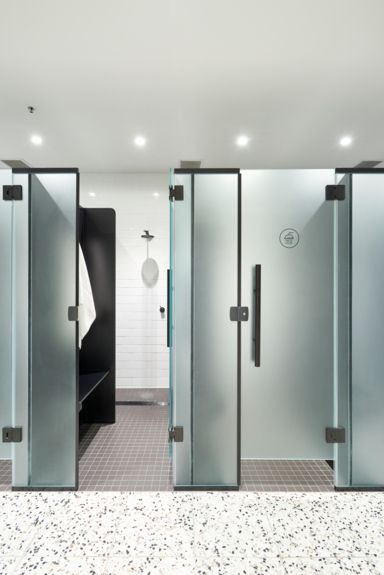 End of Trip Facility interior design frosted glass showers